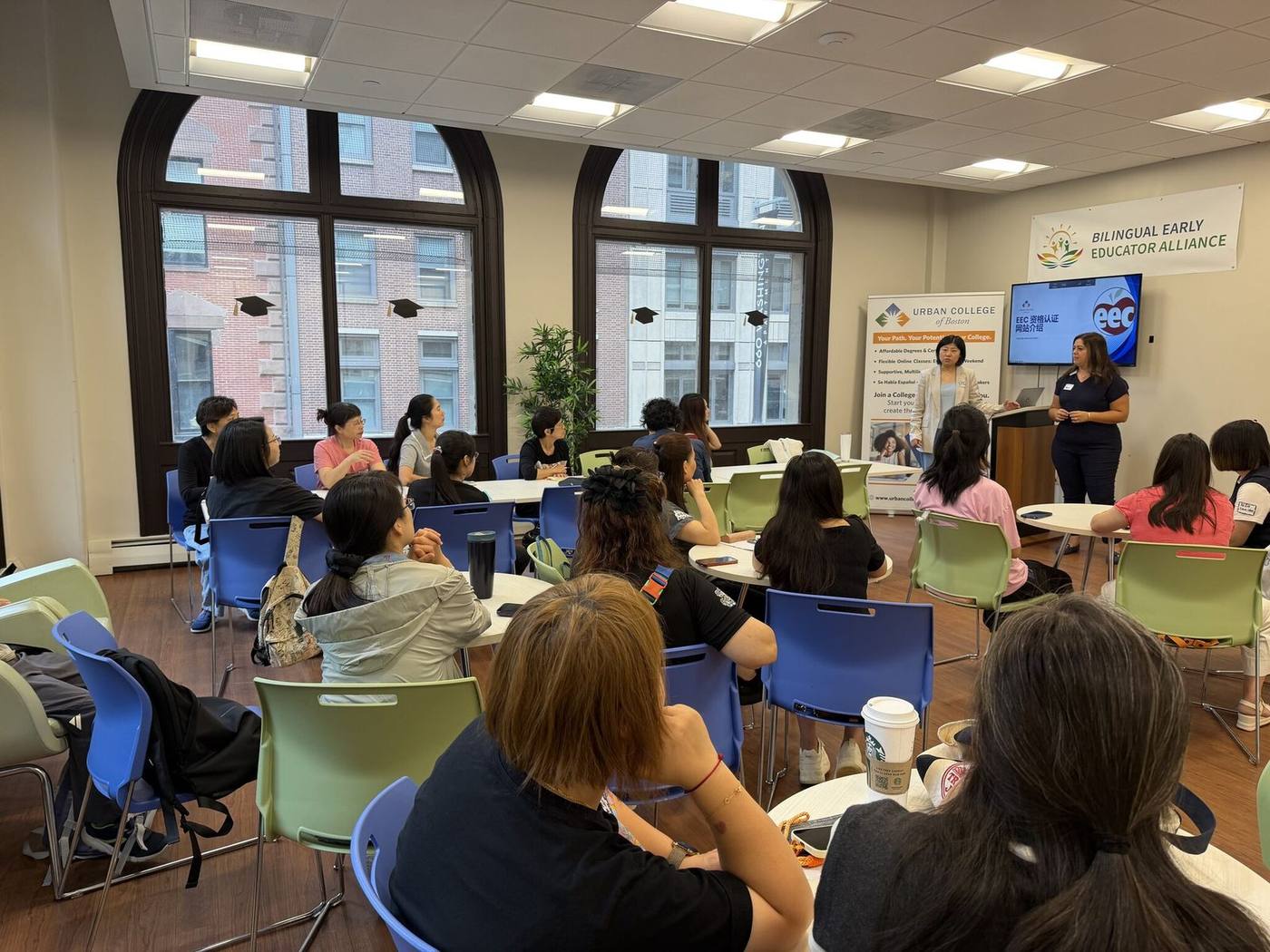 Bilingual educators attending a professional development workshop session in Boston